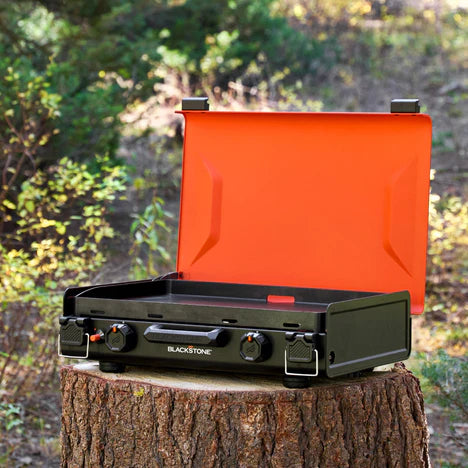 Travel-friendly 20-inch griddle with push-button ignition and rear grease cup