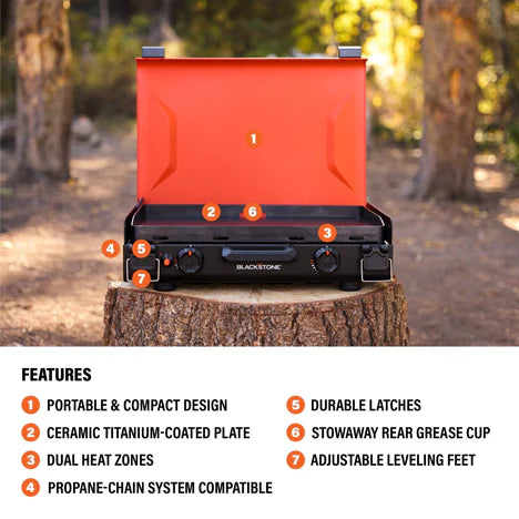 Portable camping griddle with carry handle, latching hood, and leveling feet