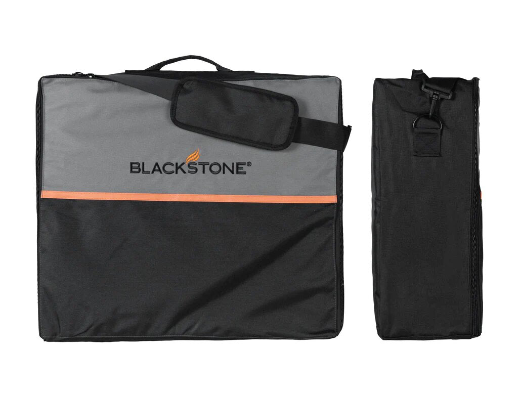 Matching Blackstone carry bag and additional accessory pouch displayed next to the griddle, showing portability and storage options