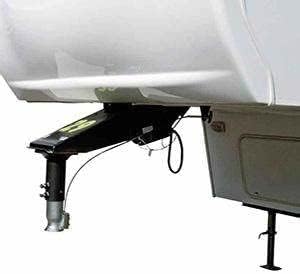 RV leveling jack attached to the rear of a recreational vehicle