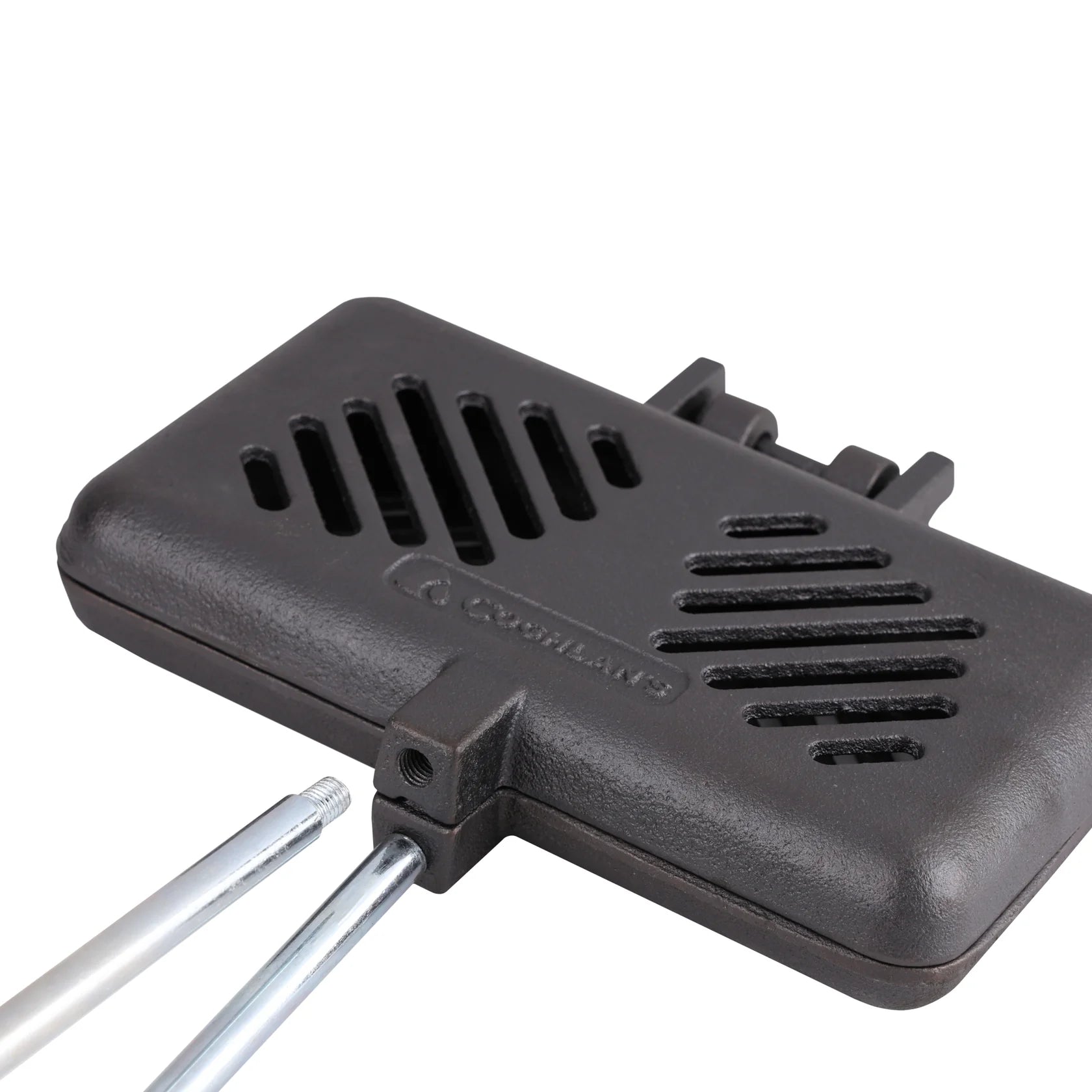 Double cast iron camping broiler grilling steaks and vegetables over outdoor BBQ, grease-draining slots for healthier cooking