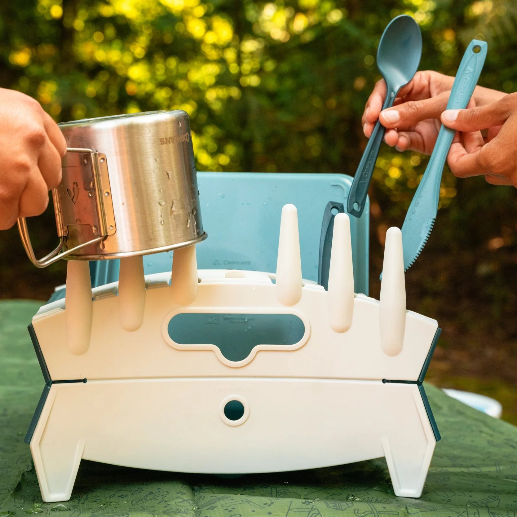 Compact outdoor dish drying rack folded flat for transport, ideal for RV kitchens, campsites, and car camping