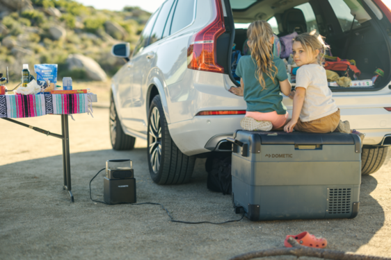 Dometic CFX2 45L electric cooler connected to AC power, showcasing dual power compatibility