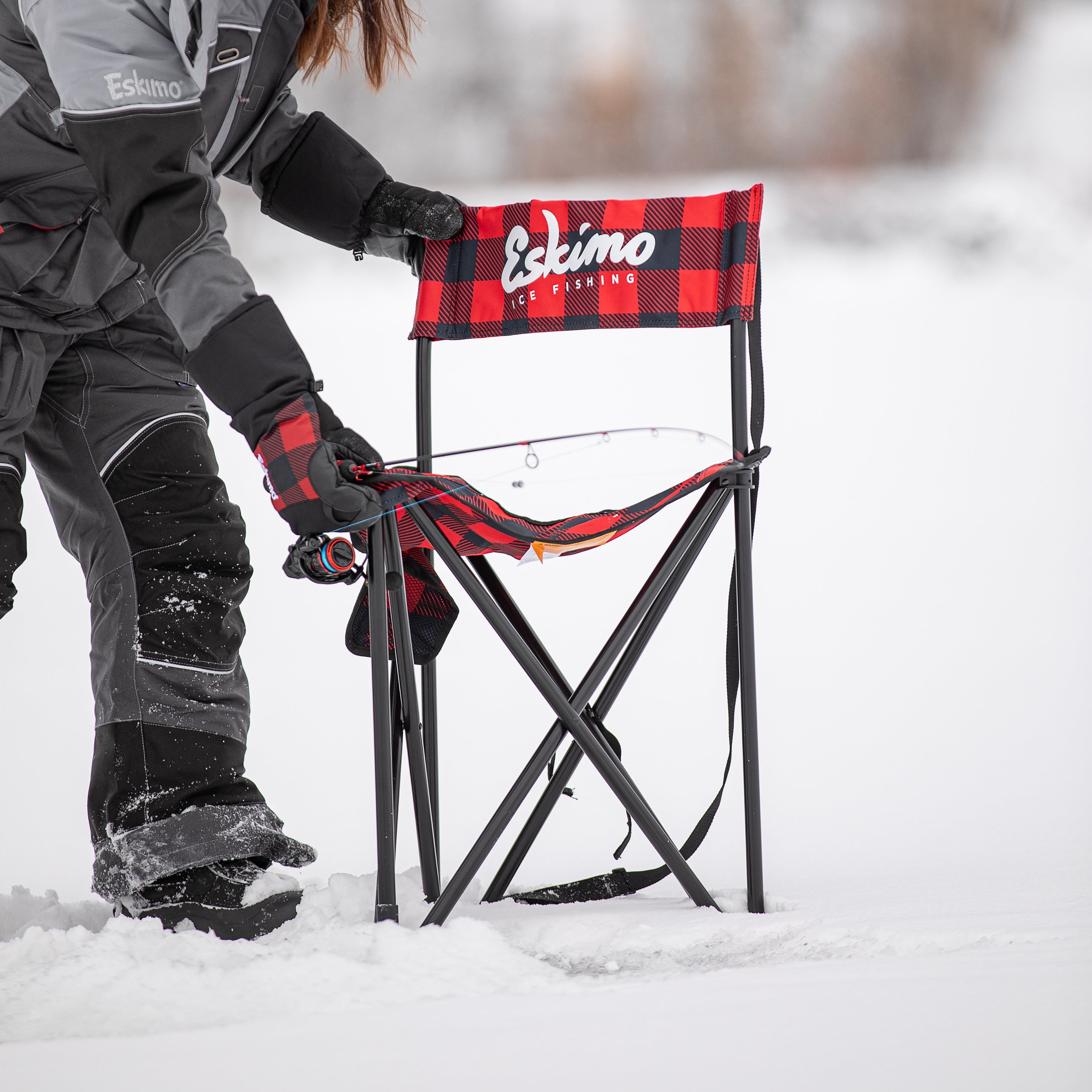 Eskimo folding chair folded with carry strap for easy transport to ice fishing, tailgates, or backyard