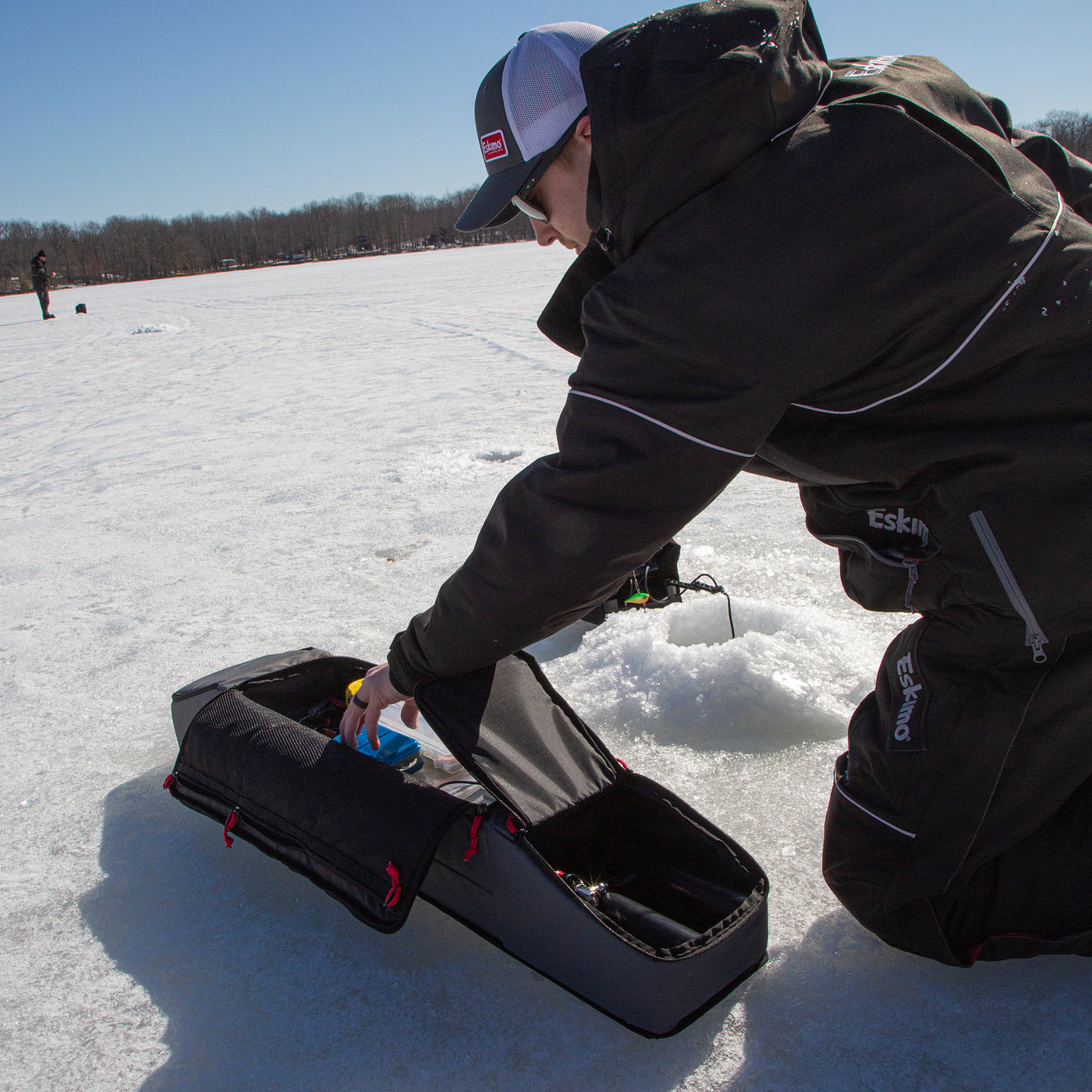 Durable and portable Eskimo Rod Locker for organized ice fishing trips
