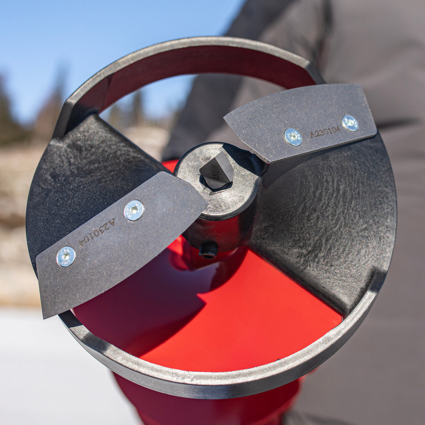 Turbo Pistol Bit 2.0 8-inch ice auger attached to cordless drill for quick ice hole drilling