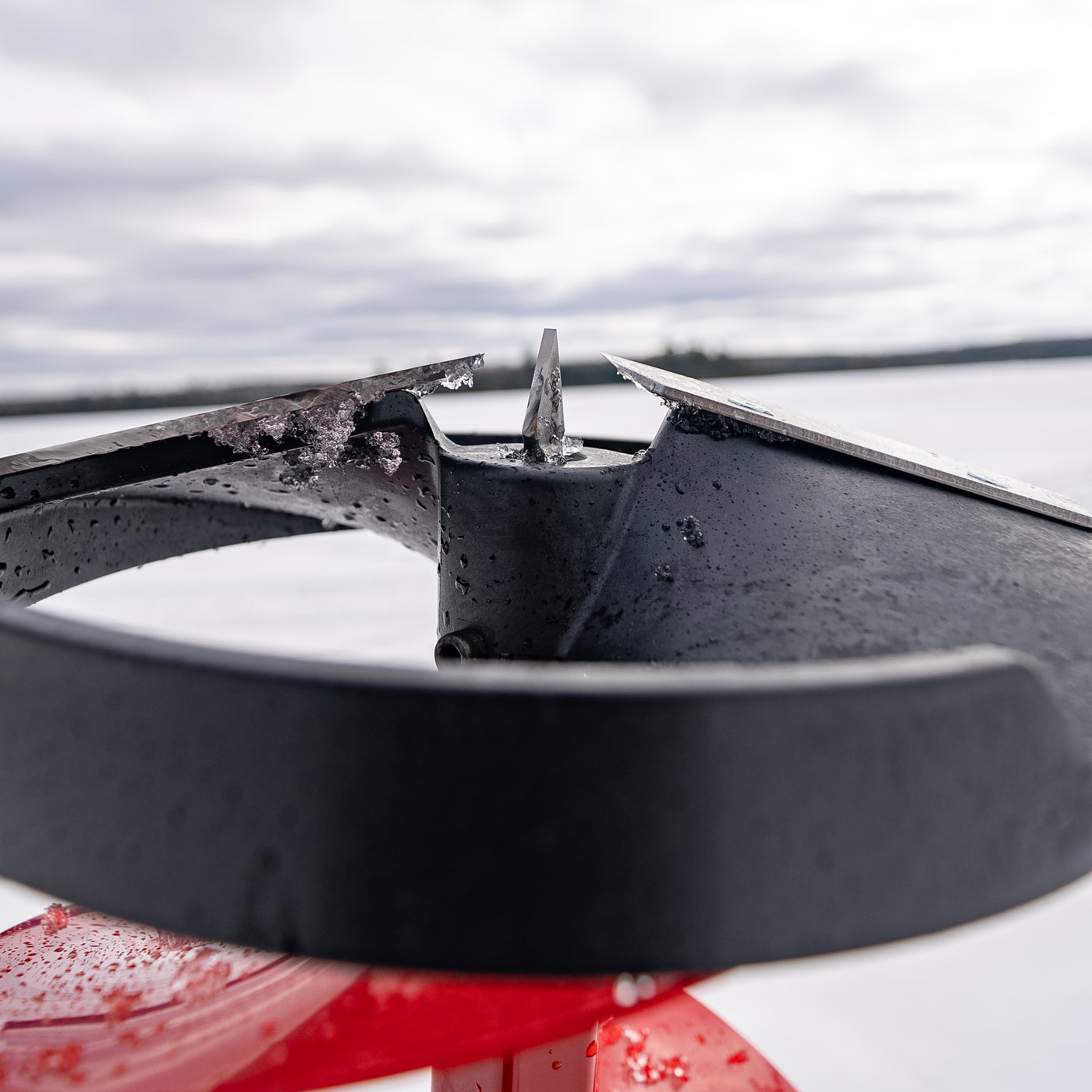 Pistol Bit 2.0 attached to a cordless drill for powerful and portable ice drilling.