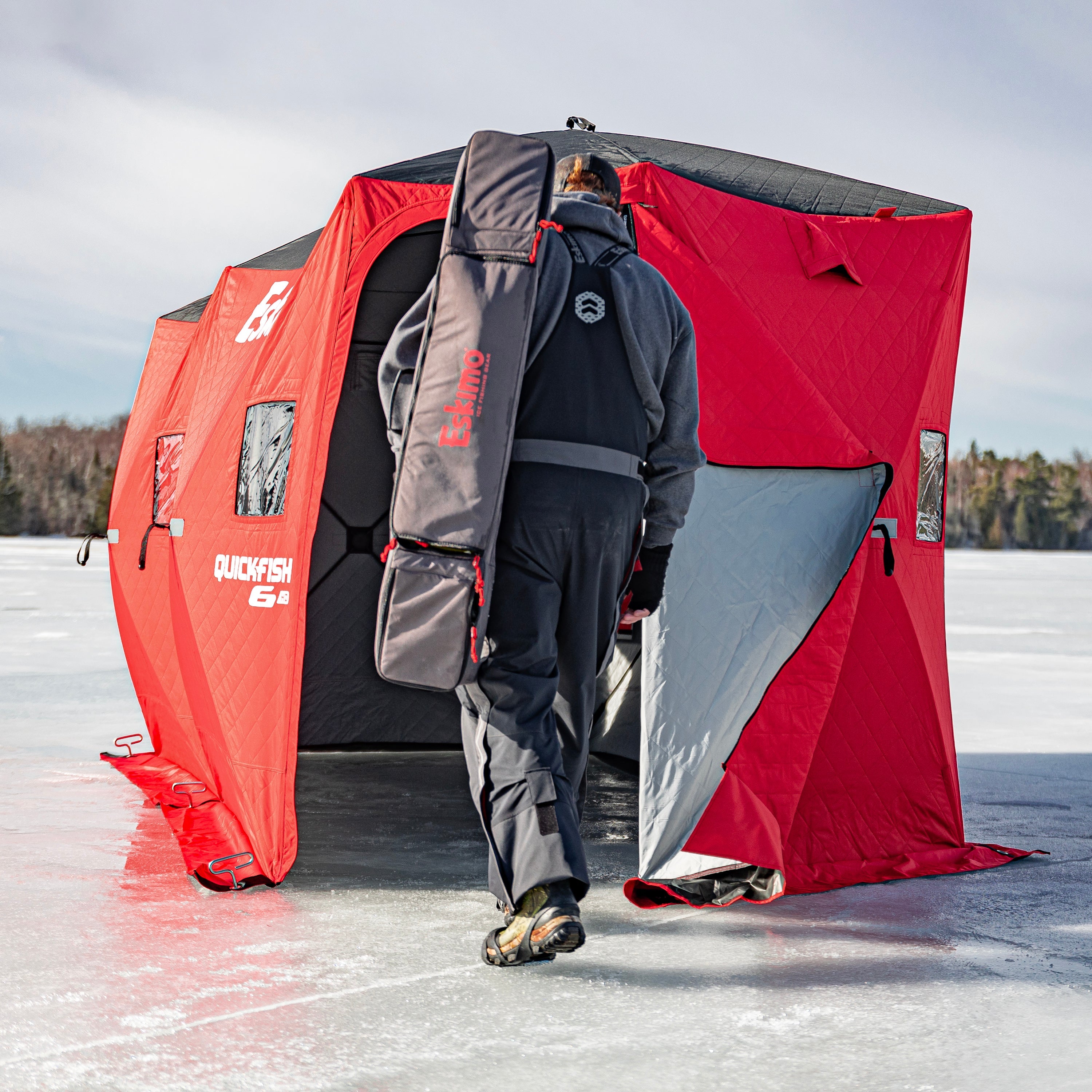 Close-up of the QuickFish HD shelter's No-Trip Door, fully unzipped from ice level for easy entry