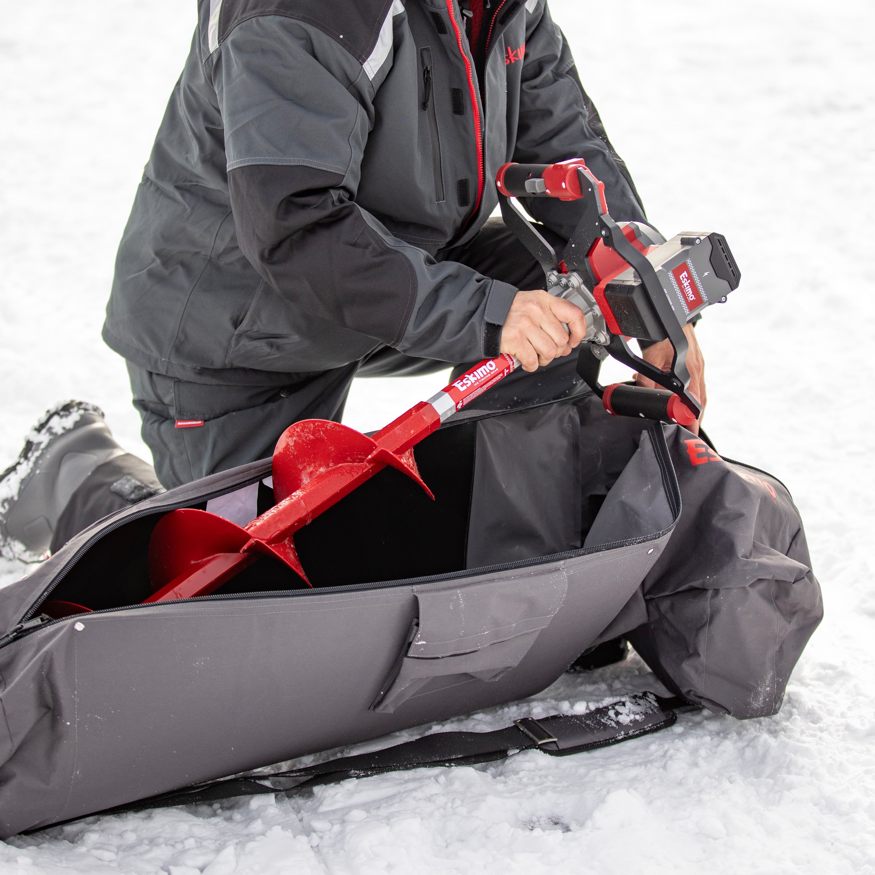 Eskimo E40 Electric Auger Carry Bag showing exterior storage pockets for tools and accessories