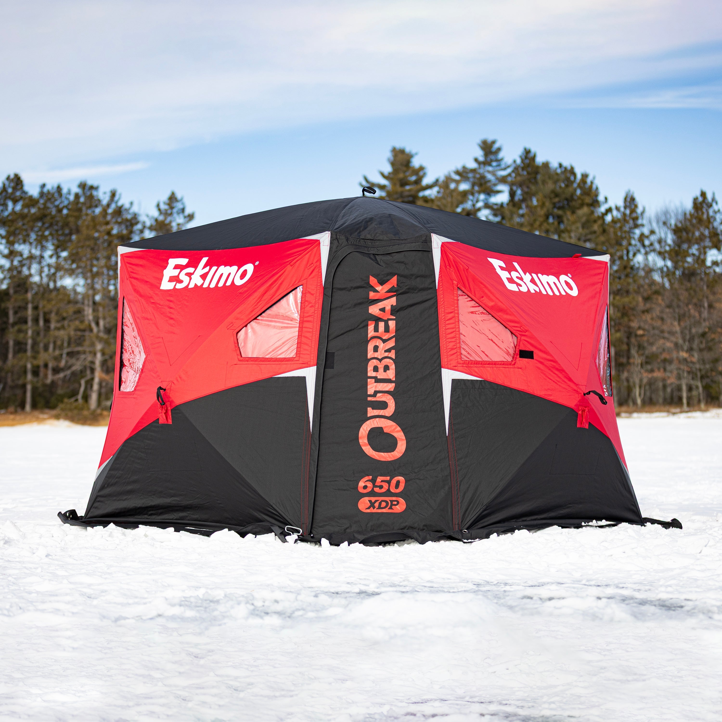 Spacious interior of Eskimo Outbreak 650XDP hub shelter with gray lining and StormShield insulation for warm ice fishing