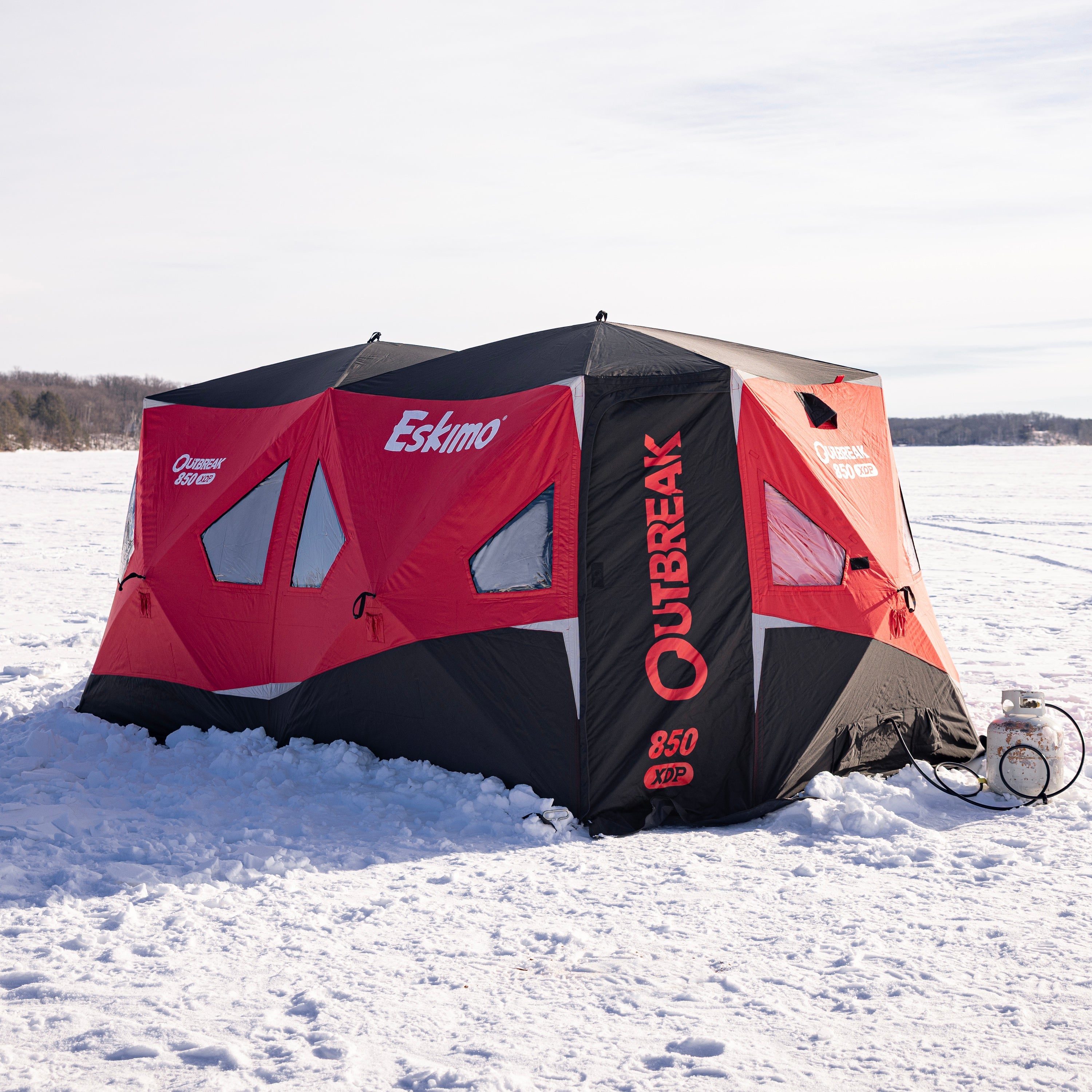 Spacious interior of Eskimo Outbreak 850XDP hub shelter with gray lining and StormShield insulation for warm ice fishing"