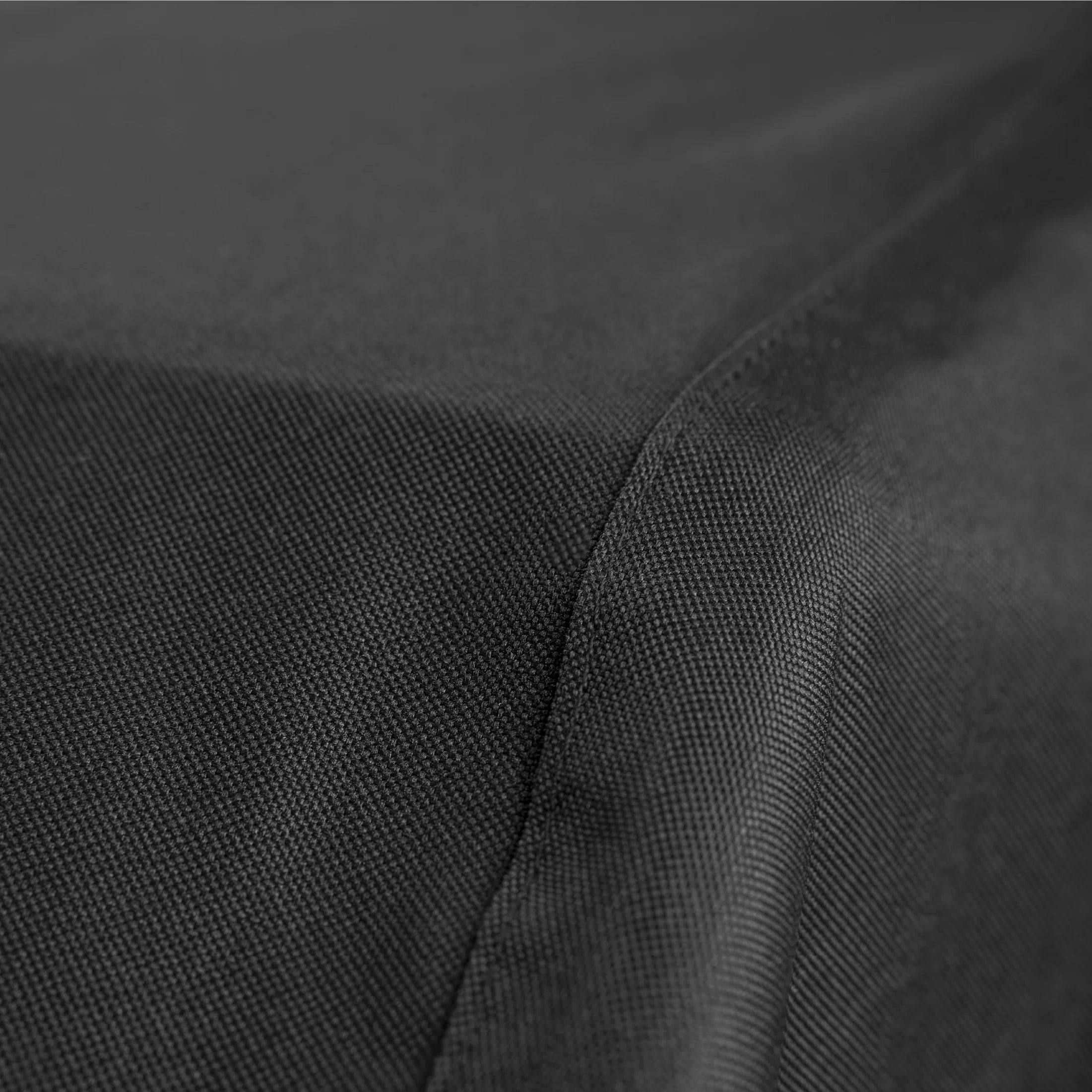 Blackstone griddle cover protecting grill from rain, sun, and dust outdoors