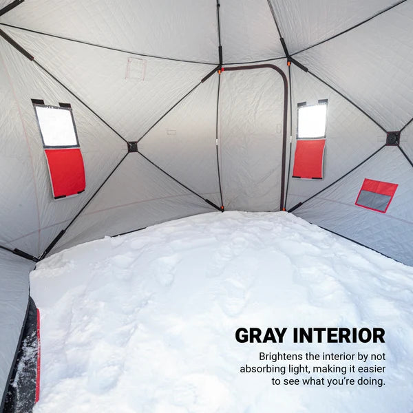 Eskimo QuickFish 4HD shelter set up on a frozen lake