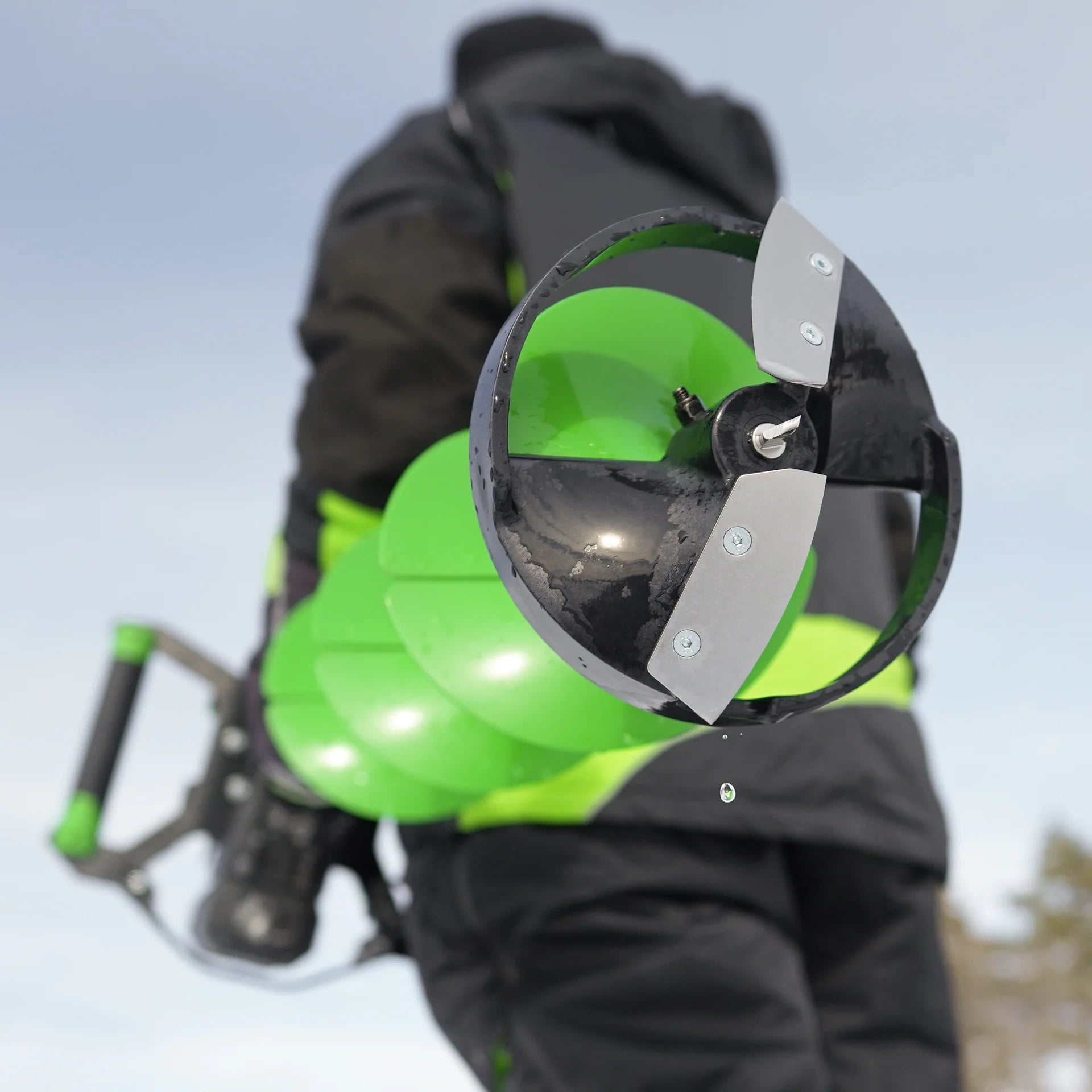 ION Alpha Plus ice auger cutting through 2000 inches of ice per charge