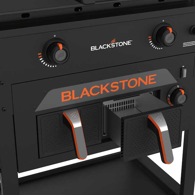 Blackstone outdoor griddle station with air fryer drawer and storage cabinet