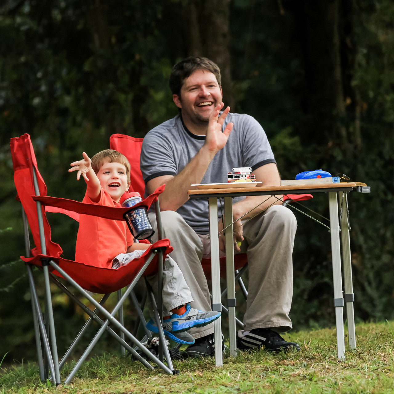 Camco folding outdoor table with bamboo surface and telescoping legs