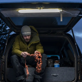 Klymit portable light on attached to the SUV