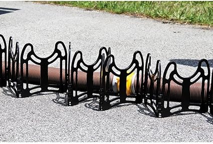 Lightweight plastic sewer hose support that stays in place
