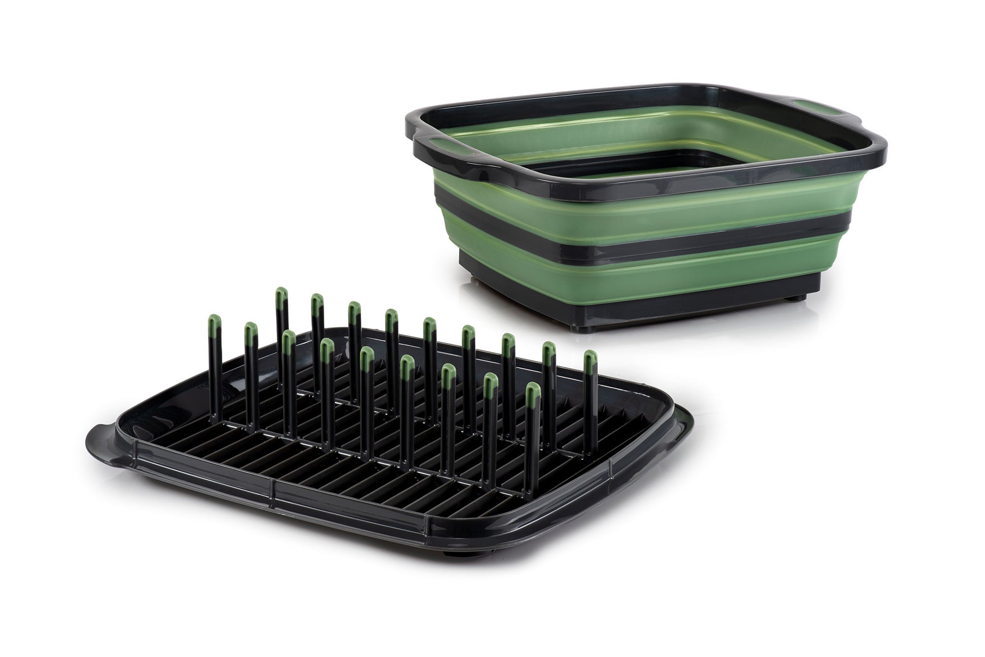 Collapsible green and black plant tray with small plants on a white background