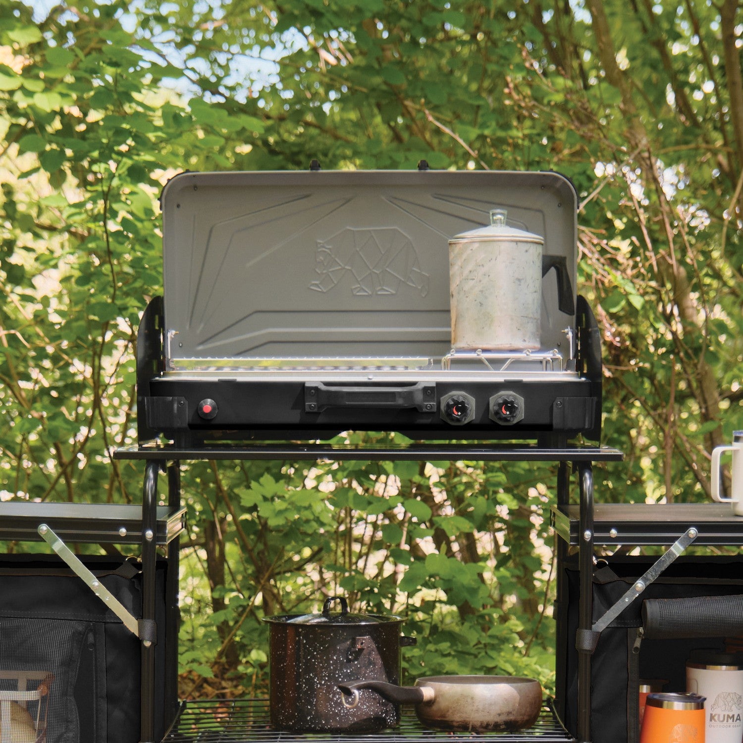 Portable Kuma propane camp stove with 33K BTU cooking power and grill grate