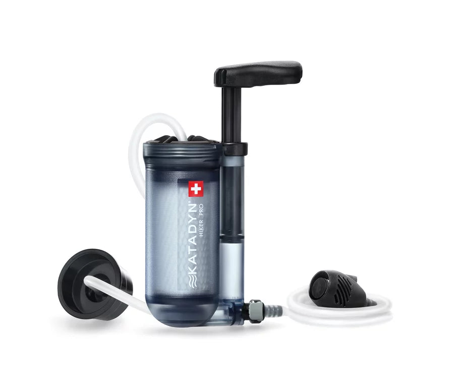 Transparent Katadyn Hiker Pro pump filter removing bacteria from stream water