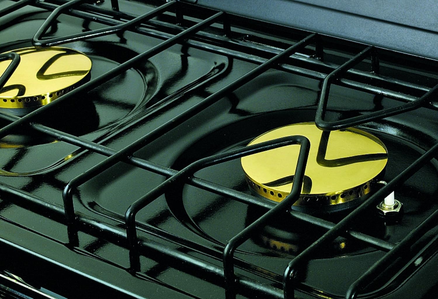 Safety gas shut-off mechanism and piezo ignition system on Martin MOS-24 stove and oven.