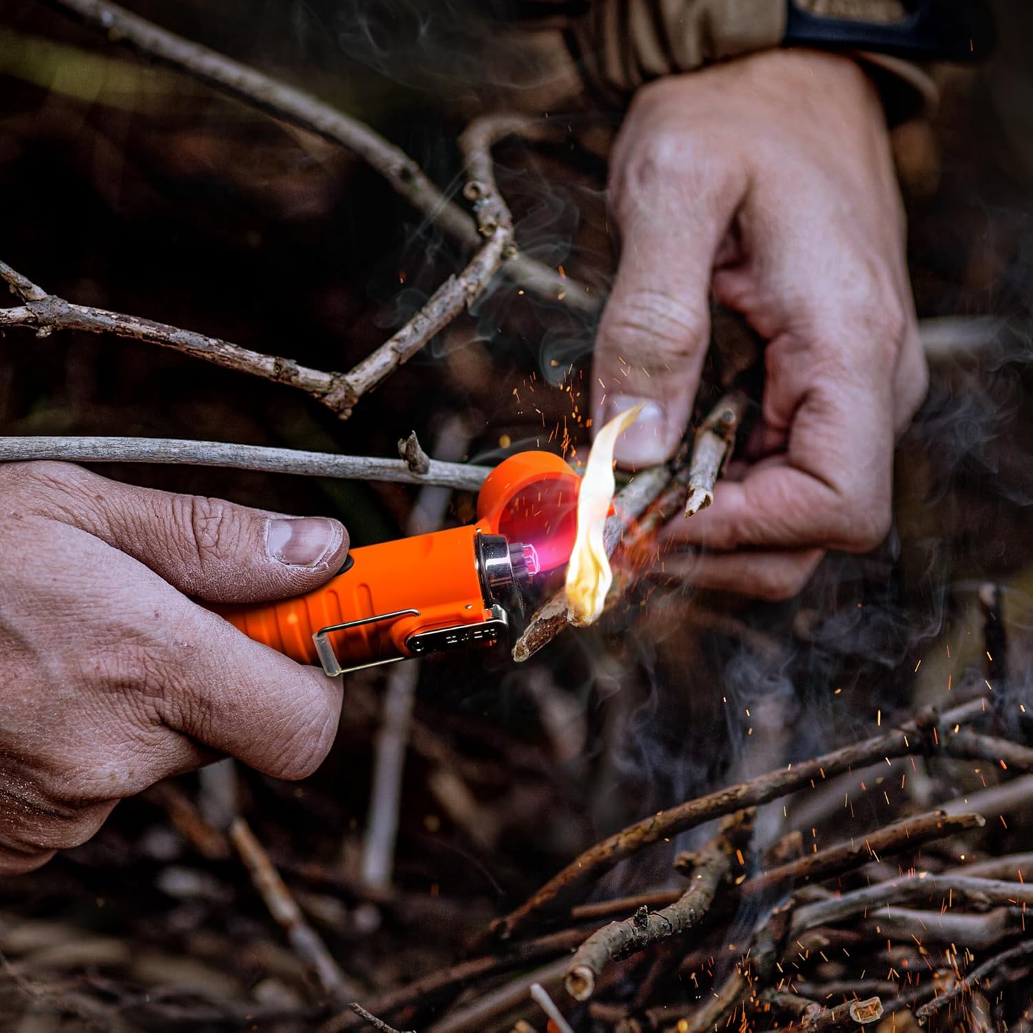 The plasma lighter with a sealed watertight cap, shown repelling water droplets to highlight its waterproof design.