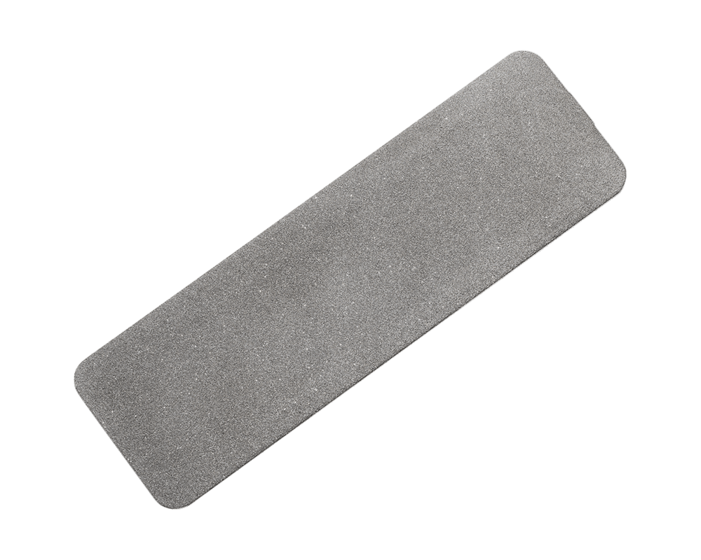 Rectangular gray sanding block on a white background