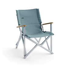 Dometic CMP C1 Compact Camp Chair unfolded, showcasing its supportive full-size seat and beechwood armrests.