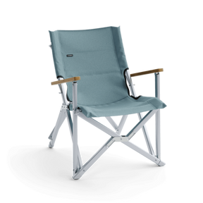Dometic CMP C1 Compact Camp Chair unfolded, showcasing its supportive full-size seat and beechwood armrests.