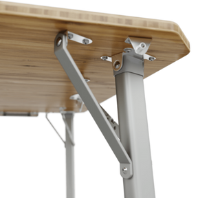 Dometic CMP T4 Table shown at three different heights: coffee table, kids’ table, and dining/prep height.