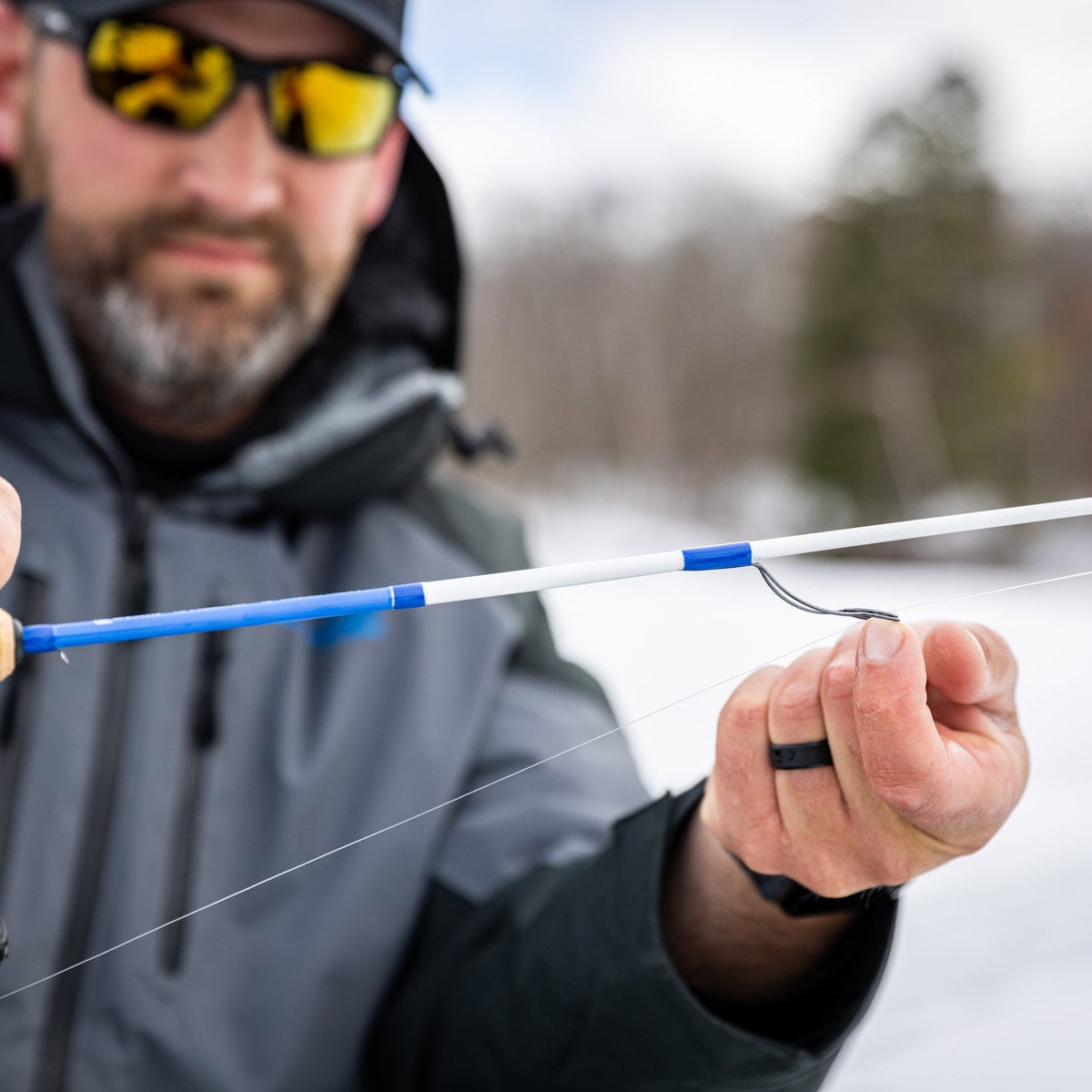 Oversized fly-style guides on Clam Predator fishing rod