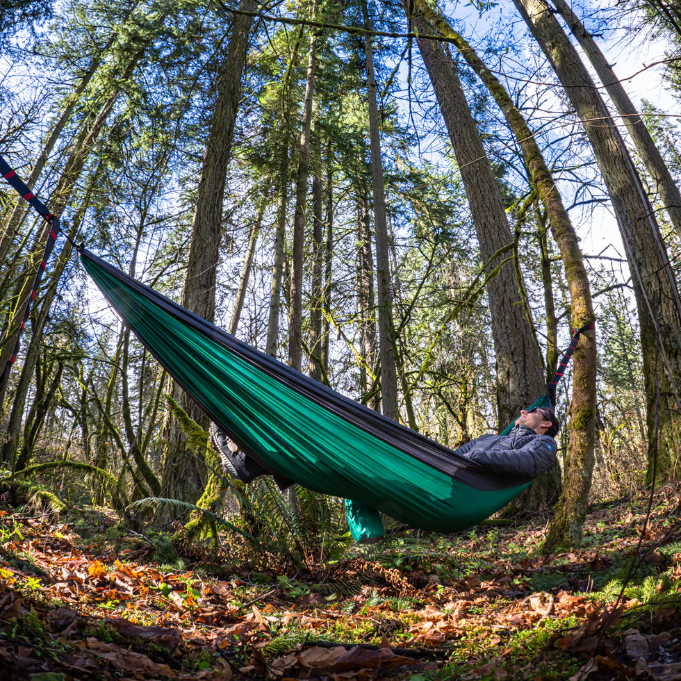 Portable backpacking hammock with included accessories for instant setup