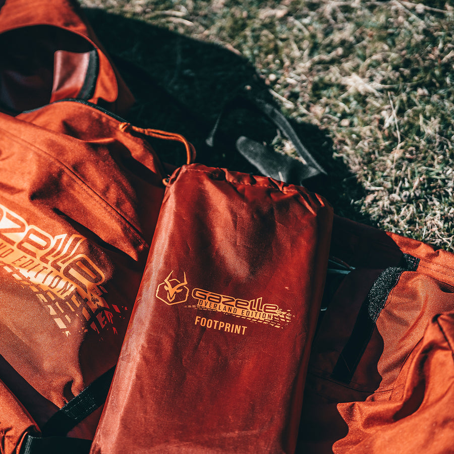 Heavy-duty Oxford weave polyester with a waterproof coating for added durability and protection.