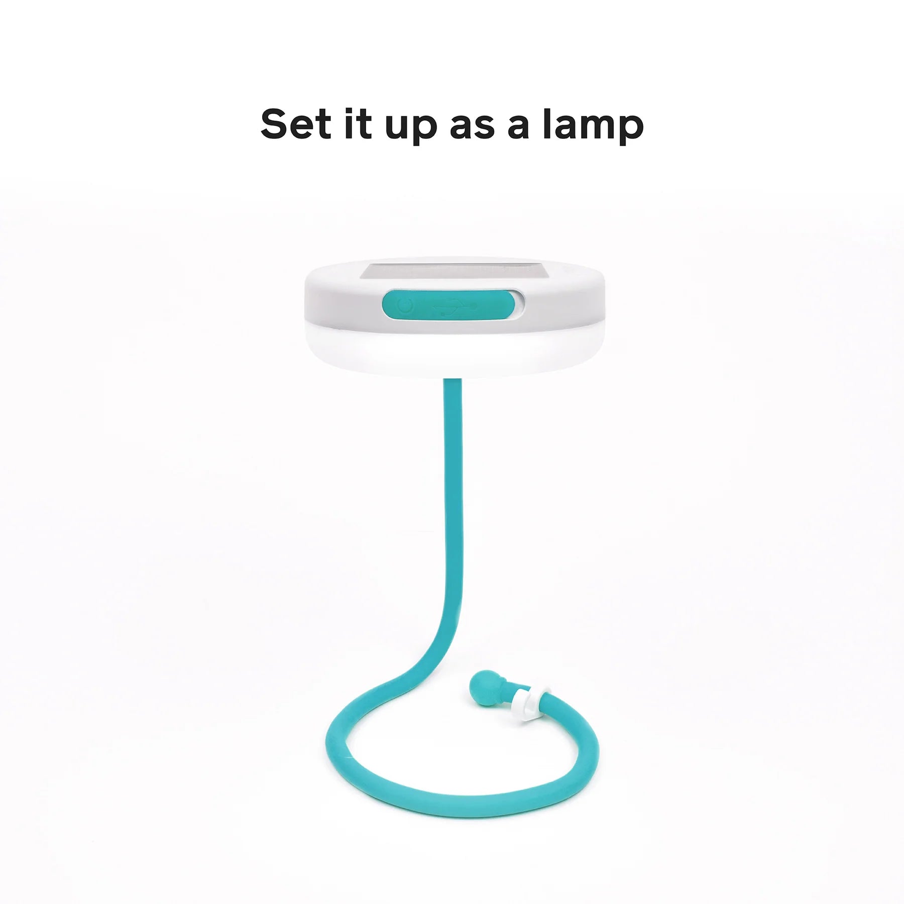 Turquoise lamp with a white base on a white background