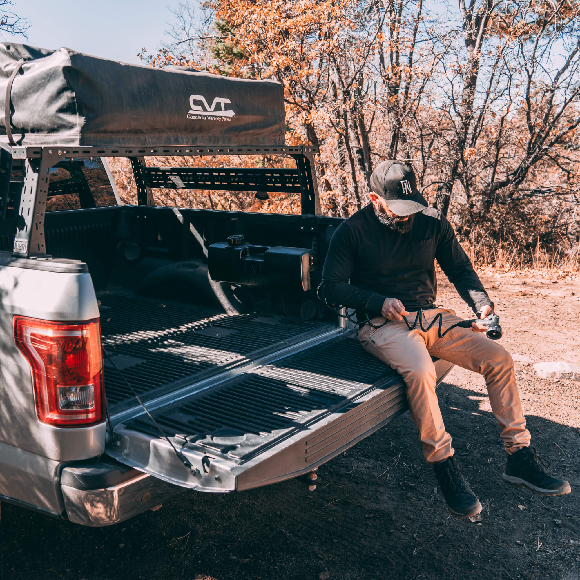 WaterPORT tank mounted on Ford truck during camping trip for outdoor water access