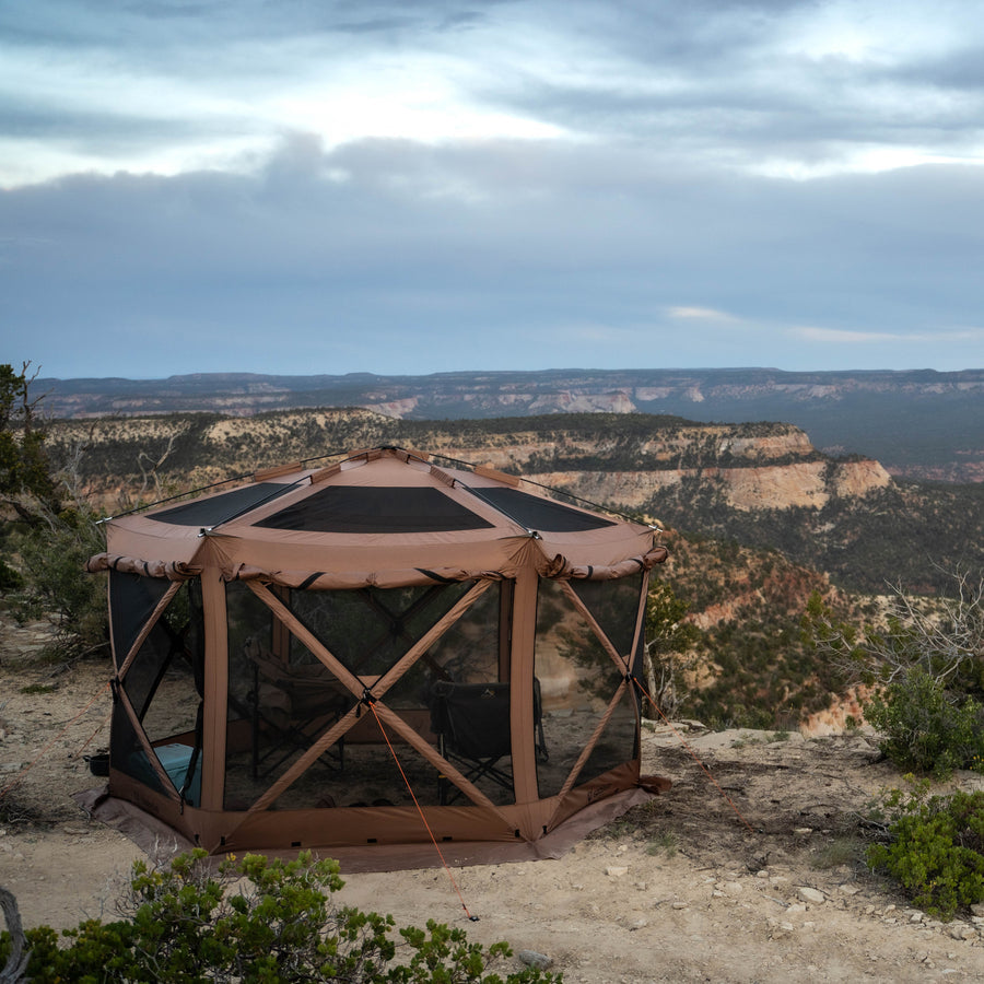 Detail of Gazelle G6 Cool Top gazebo's side panels and mesh venting under canopy—highlighting triangular framing and airflow design