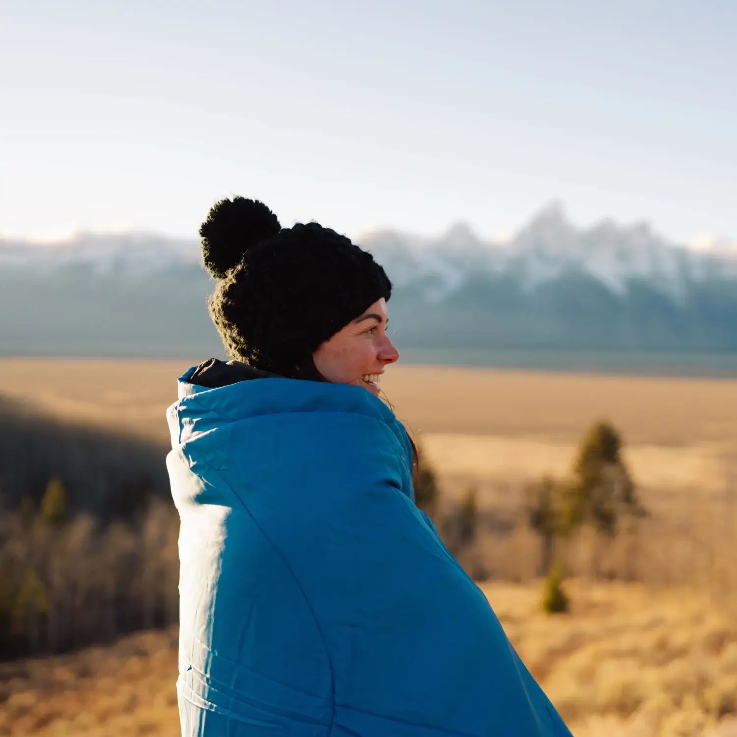 Horizon blanket compressed for easy storage in backpack or camping gear
