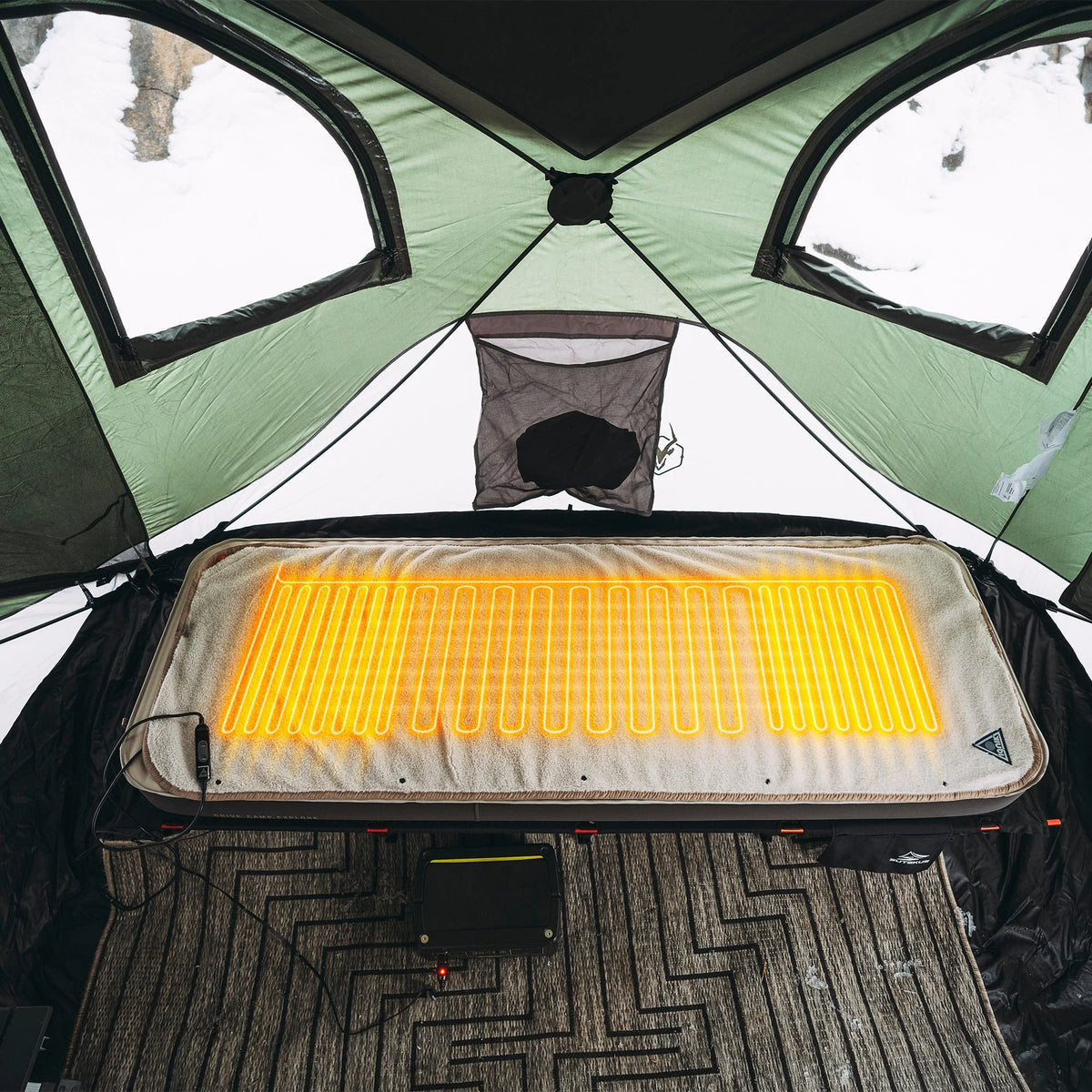 Ignik Flipside Fleece 12V heated camping bed cover measuring 25 by 72 inches