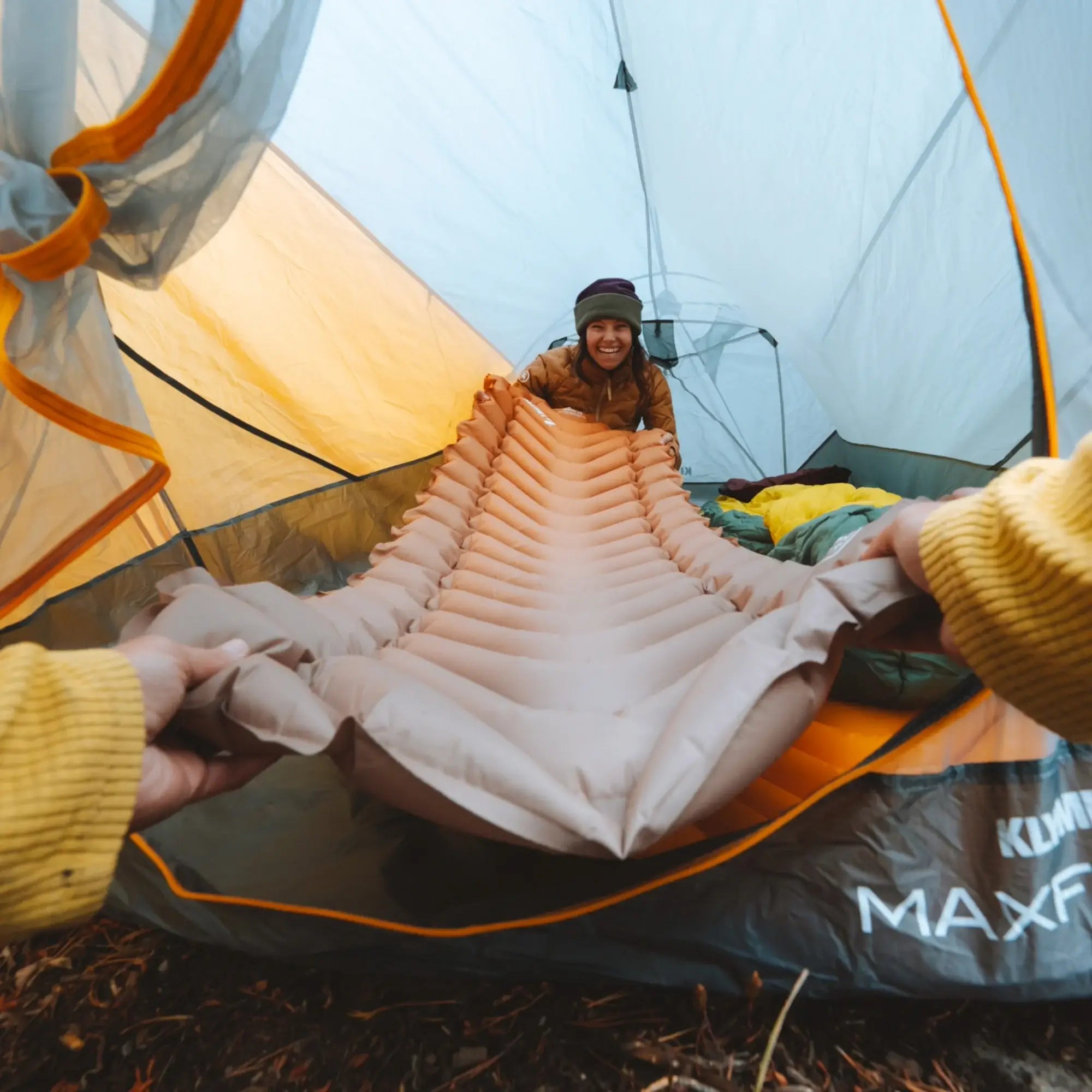 Close-up view of Klymit Flip Valve™ for fast inflation and deflation of the Insulated Static V2 sleeping pad