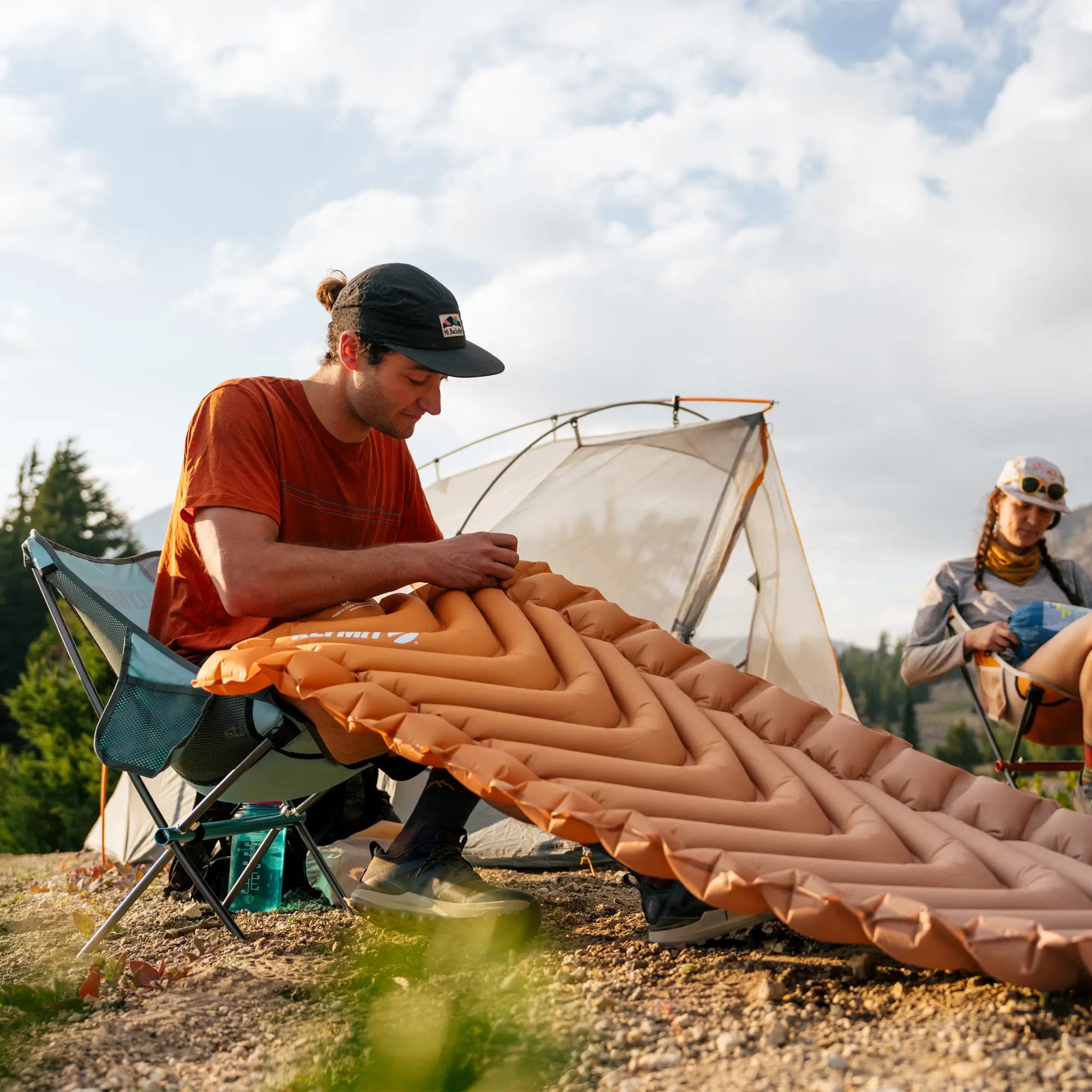 Close-up view of Klymit Flip Valve™ for fast inflation and deflation of the Insulated Static V2 sleeping pad