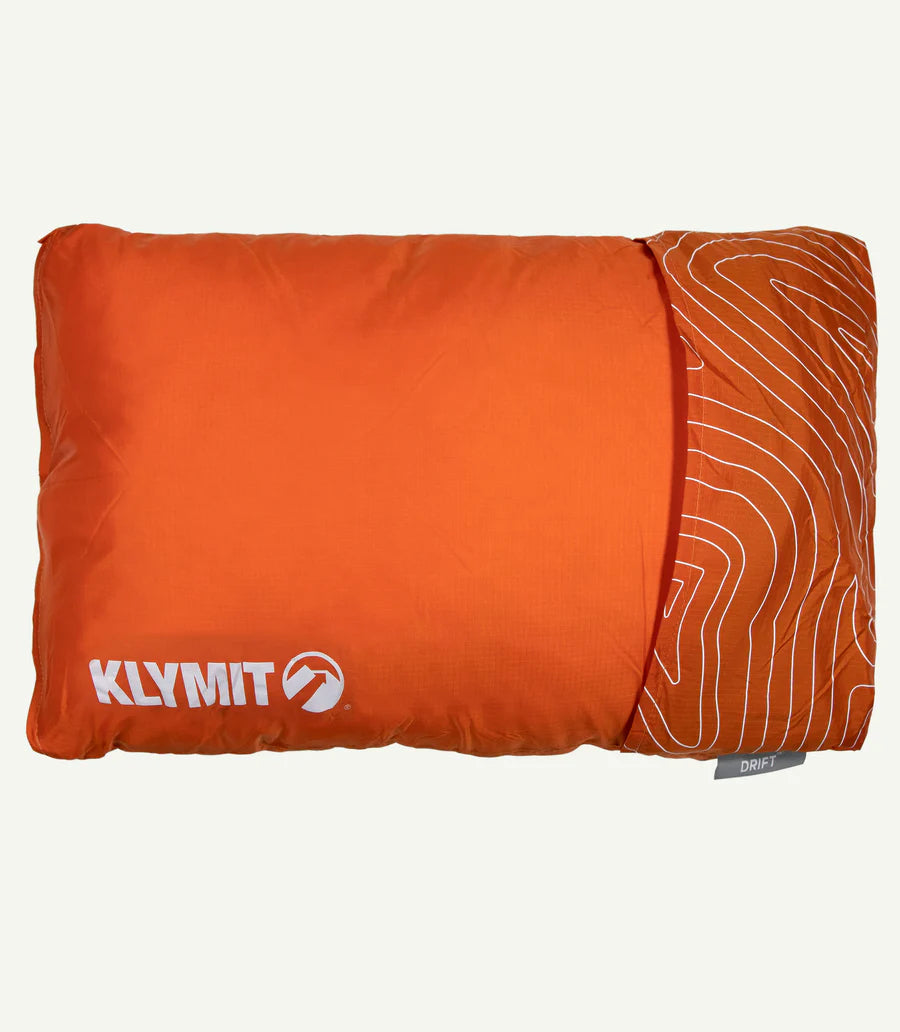 Orange camping pillow with Klymit logo on a white background