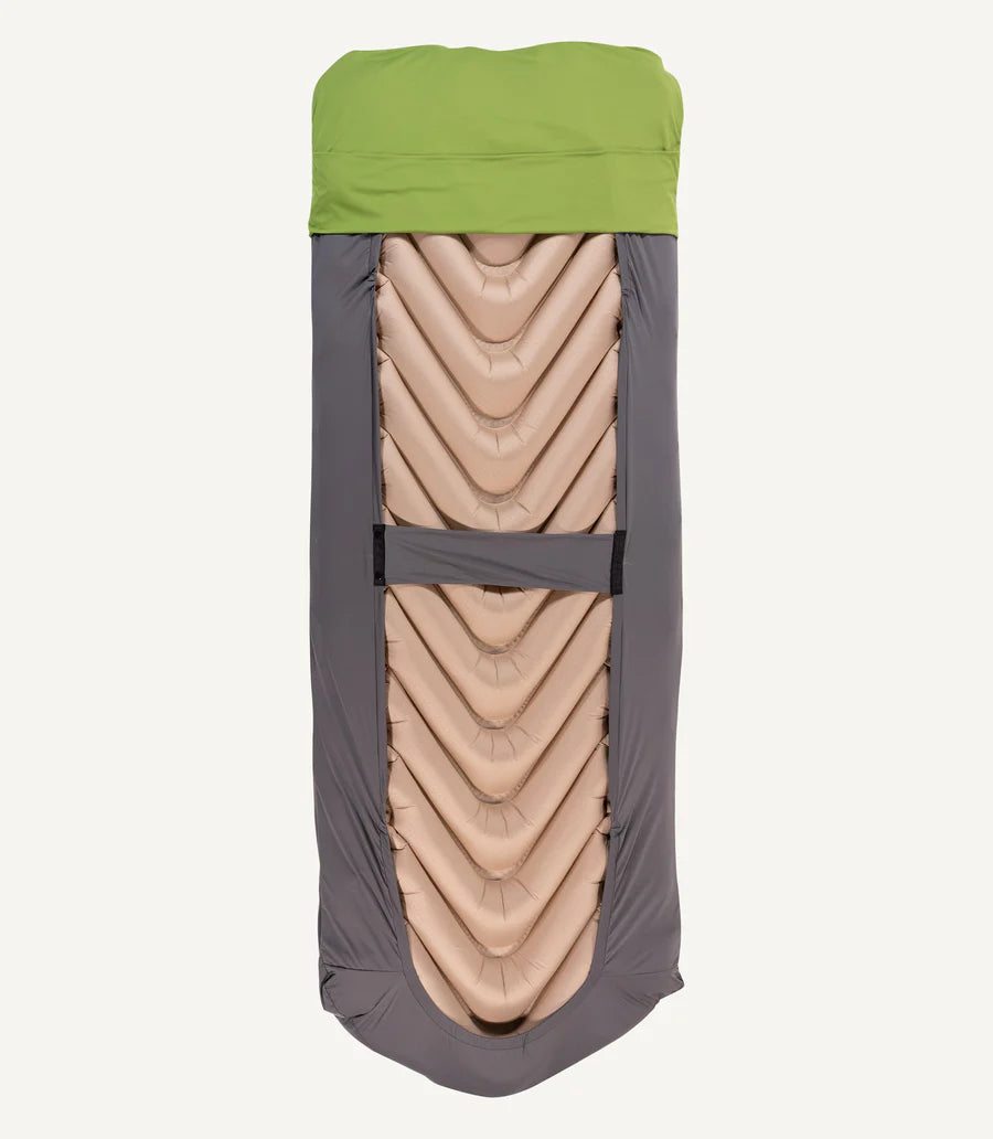 Detailed view of the integrated pocket holding a pillow in place, highlighting its practicality and thoughtful design.