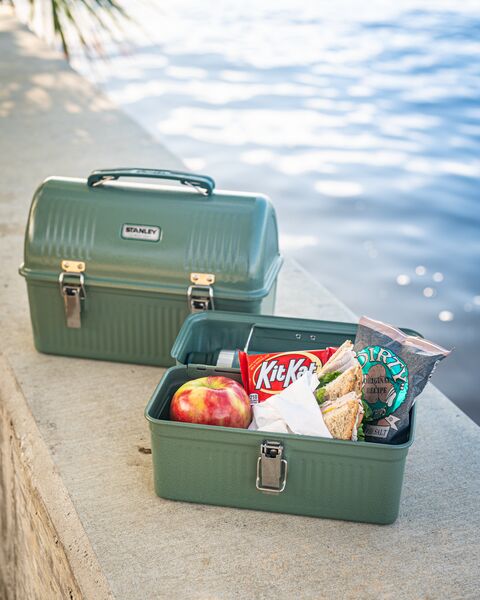Insulated steel lunch box with locking handle and bottle holder