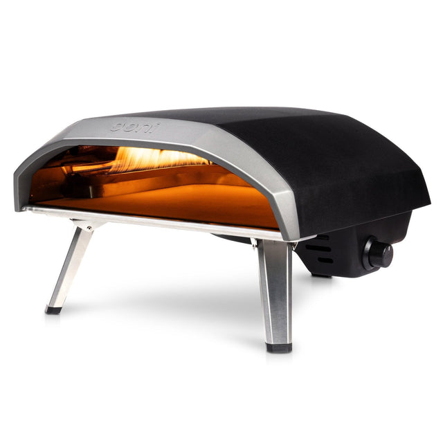 Portable pizza oven with glowing interior on a white background