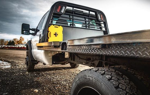 rotopax 2 gallon tank mounted on a work truck