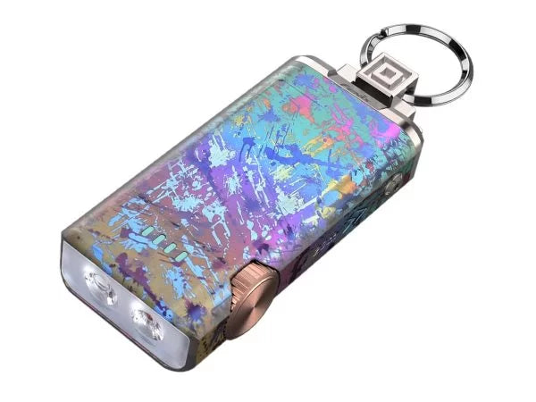 Compact titanium alloy Fenix APEX 20 flashlight with white and red light