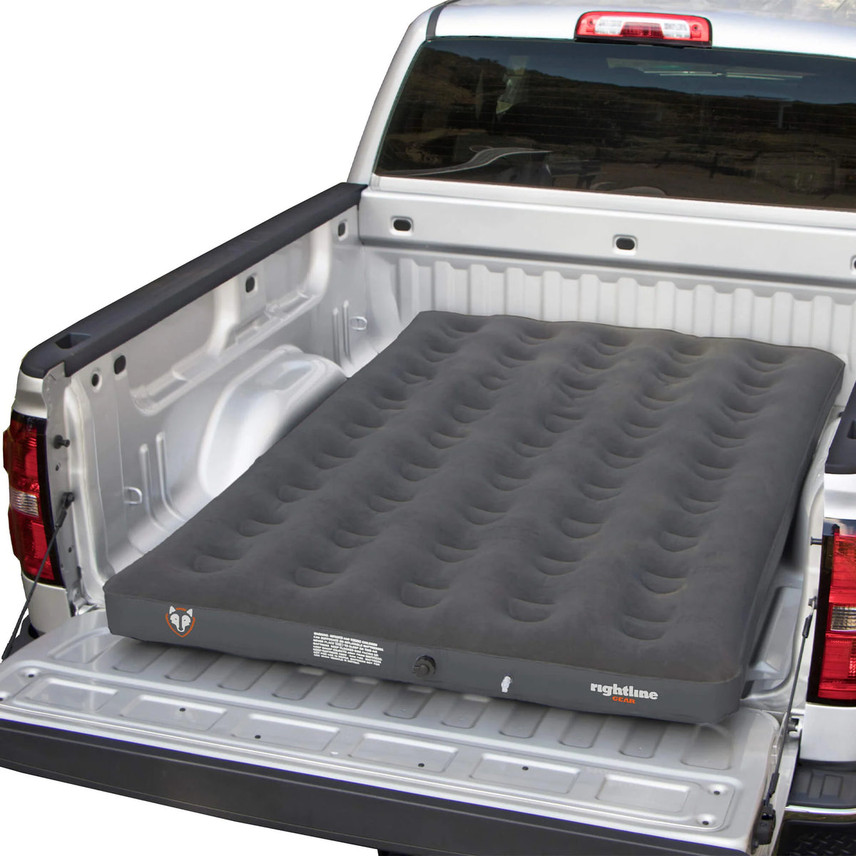 Close-up view of the comfortable flocked-top surface of the truck bed air mattress.