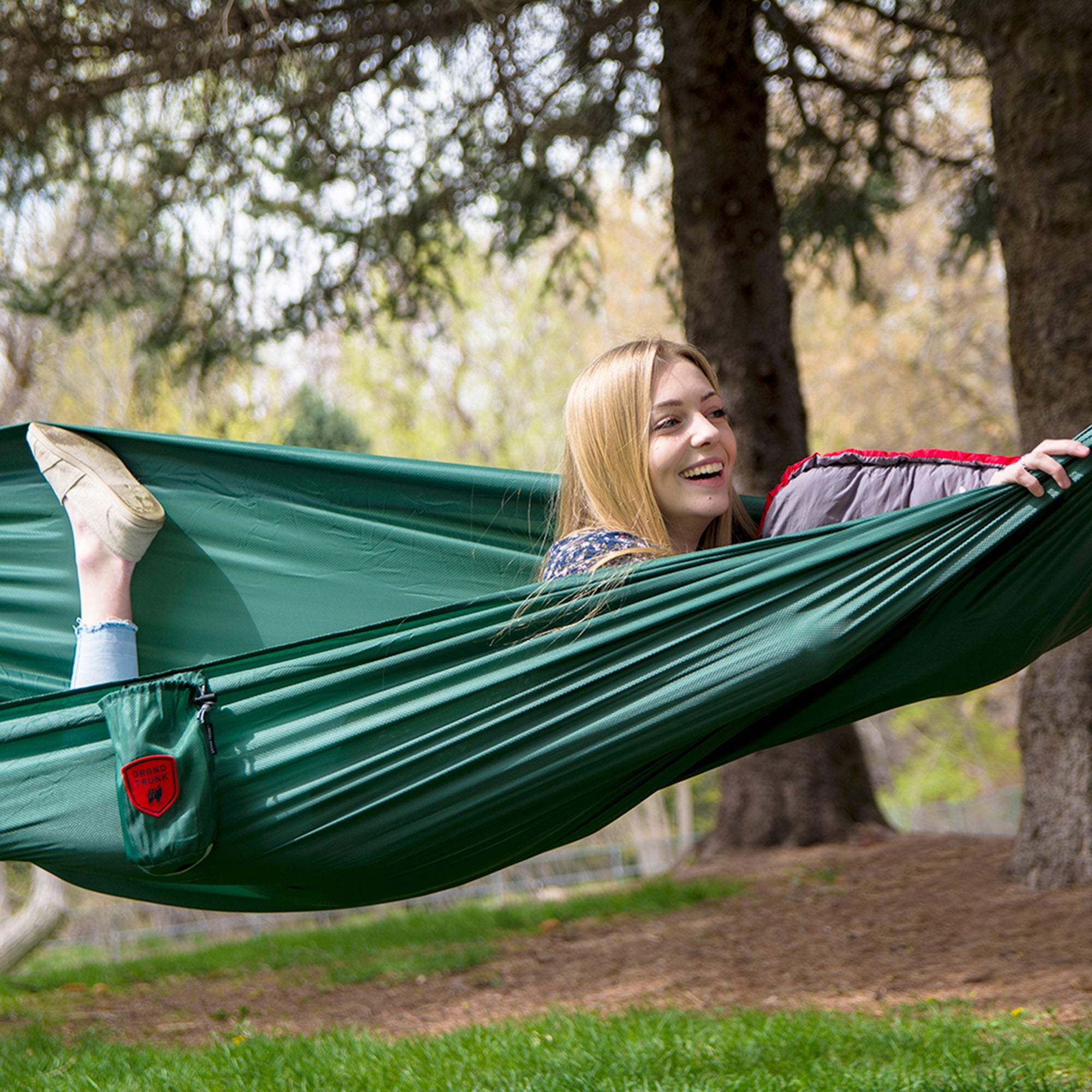 Portable travel hammock weighing only 12 oz for backpacking, camping trips, and outdoor recreation