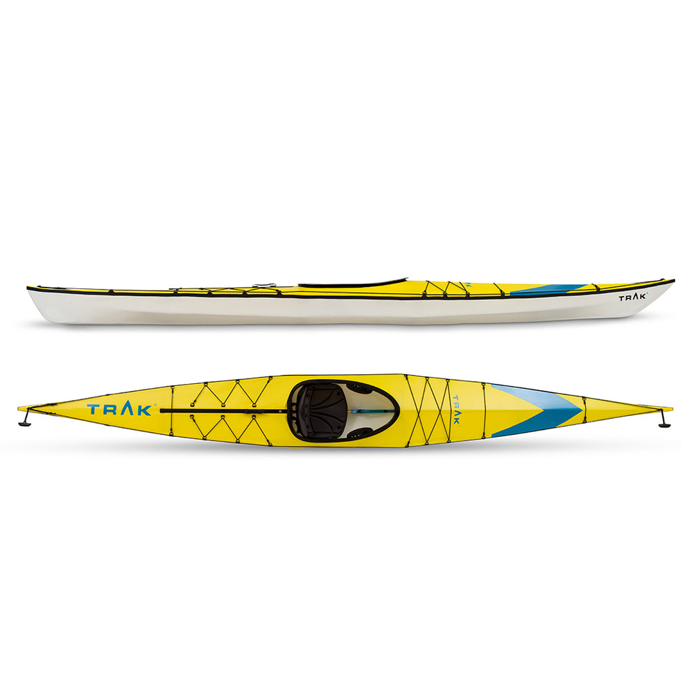 TRAK 2.0 folding kayak fully assembled on a scenic shoreline